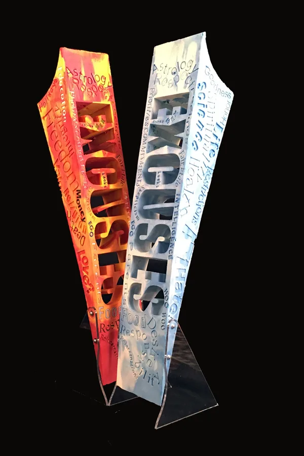 sculptural artwork of the word excuse
